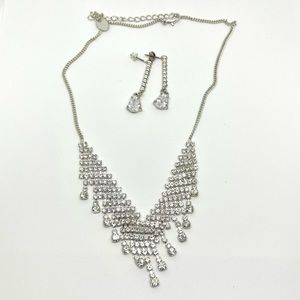 Claire’s V shaped rhinestone necklace and earrings